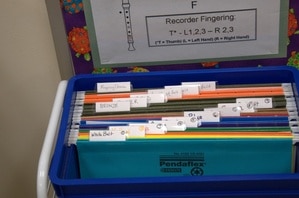 A color coded box to help you sort recorder homework for students.