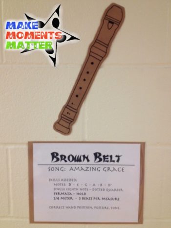 Brown paper recorder with accompanying sign.