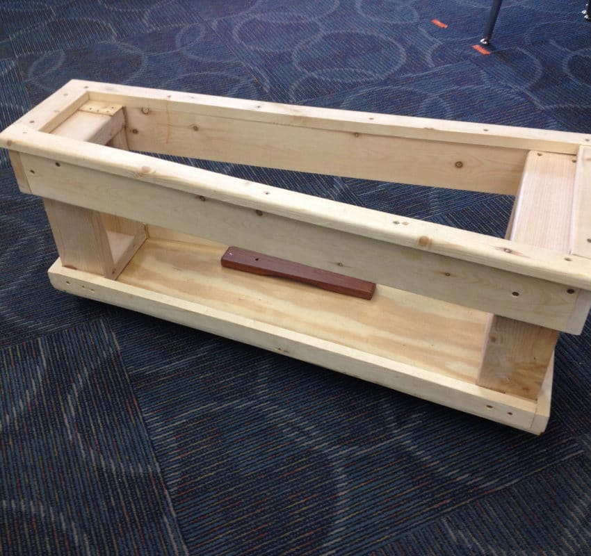 A homemade cart for barred percussion instruments.