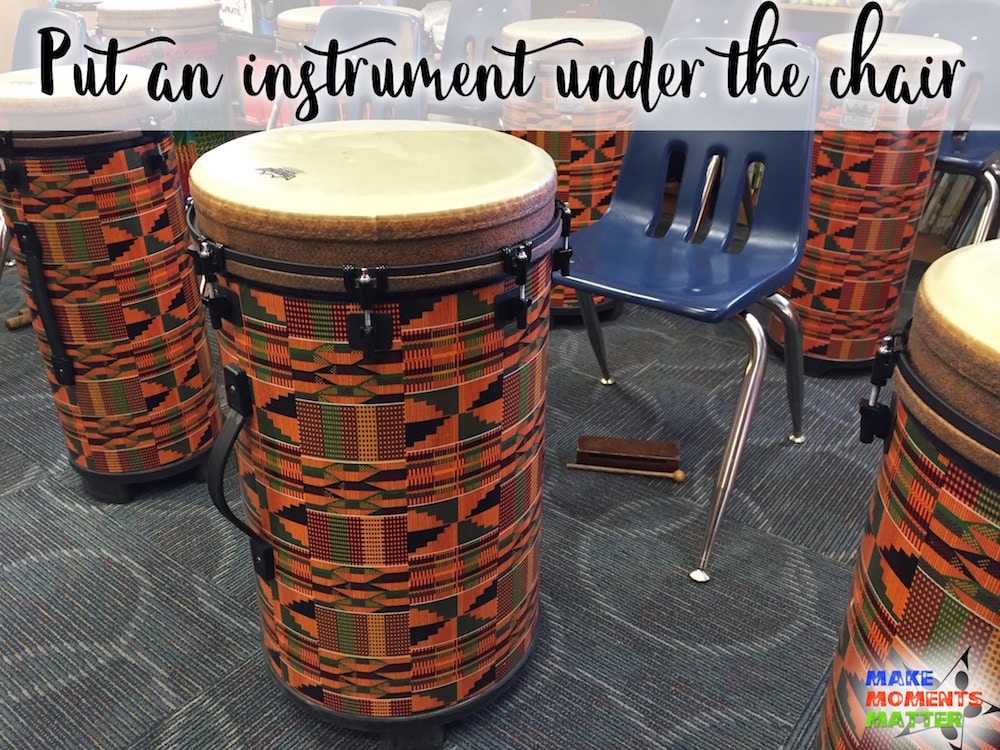 Add a non-pitched percussion instrument under each chair
