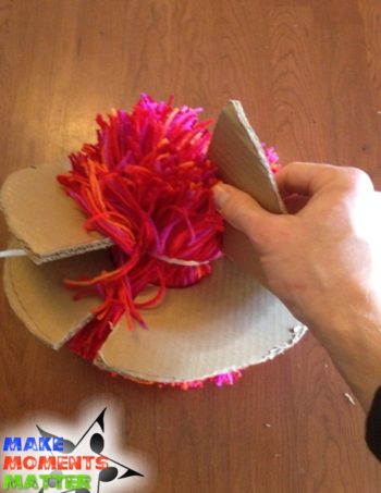 Click here to see a step-by-step process to make your very own yarn ball!