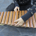 Teaching students how to take off and put bars on your percussion instruments.