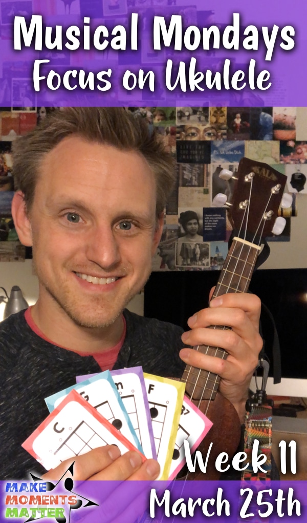 Music Teacher holding ukulele and chord flash cards